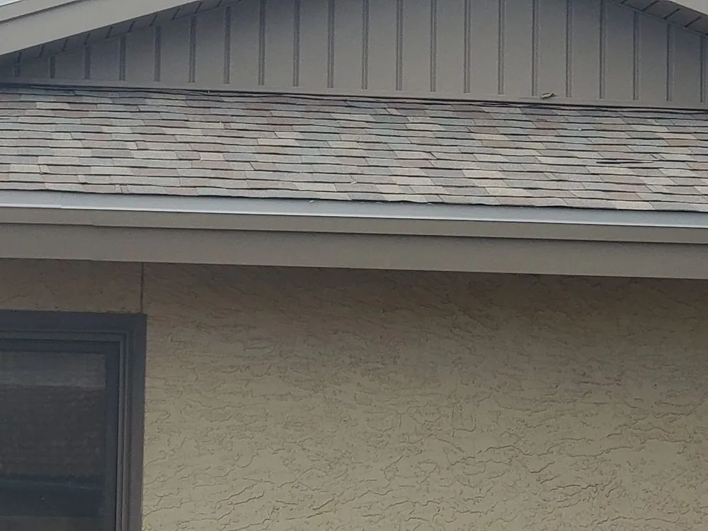 Slide of T&K Roofing