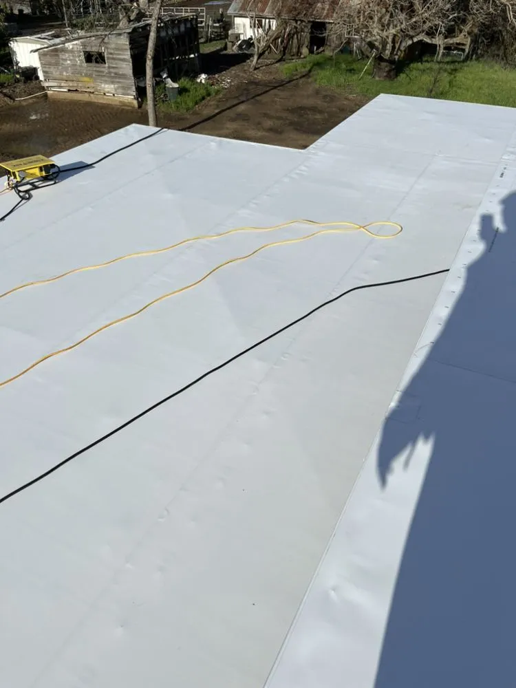 Slide of T&K Roofing