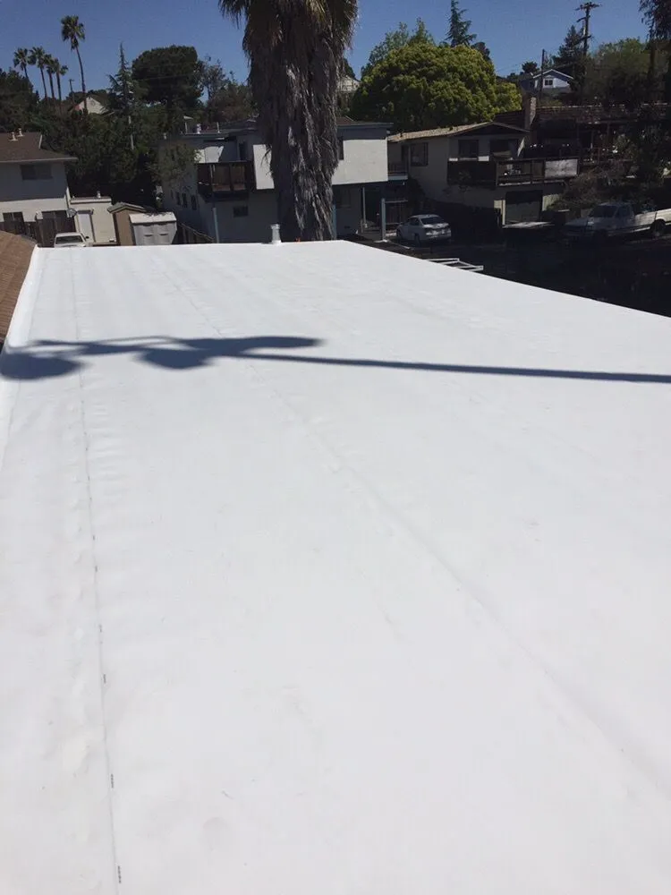 Slide of T&K Roofing