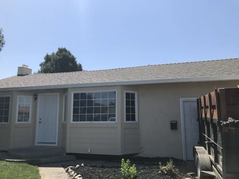 Slide of T&K Roofing