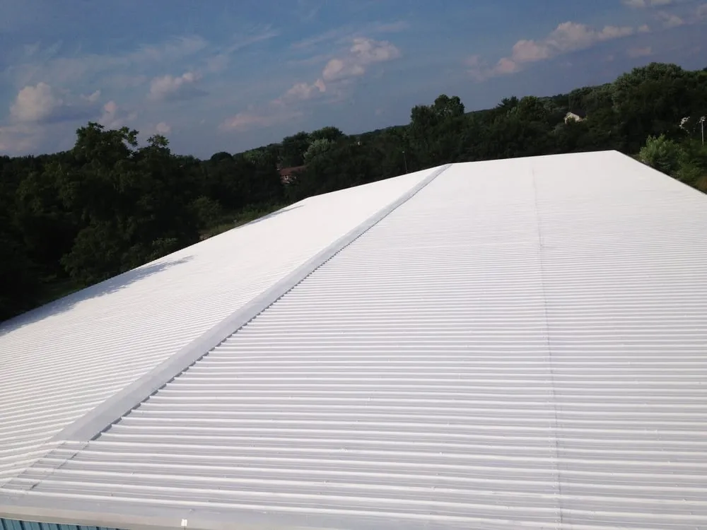 Slide of TLC Pro Roofing