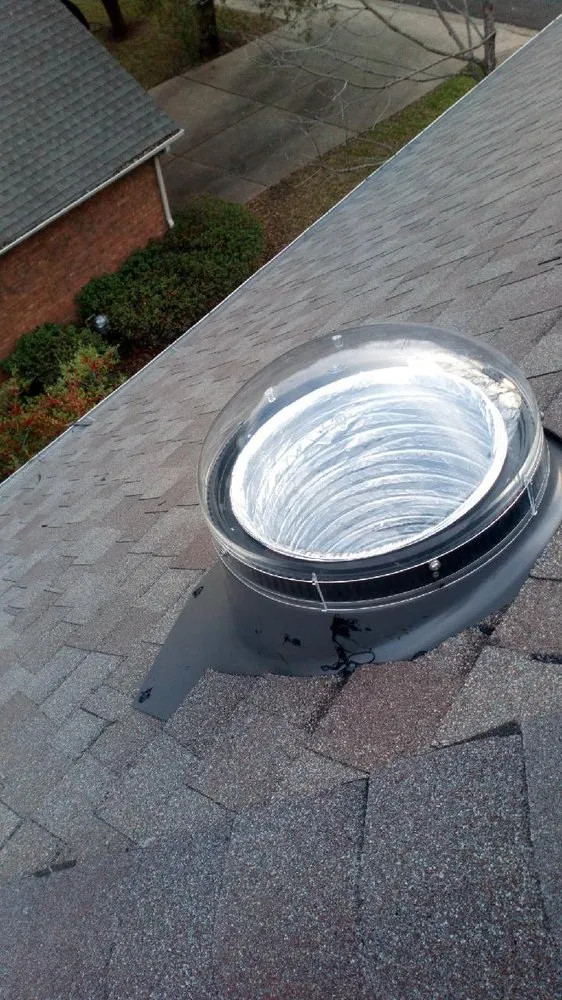 Slide of TLC Roofing