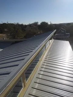 Slide of TLC Roofing