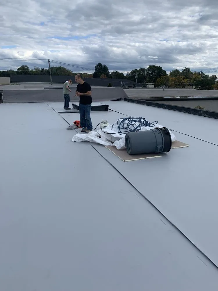 Slide of TLC Roofing