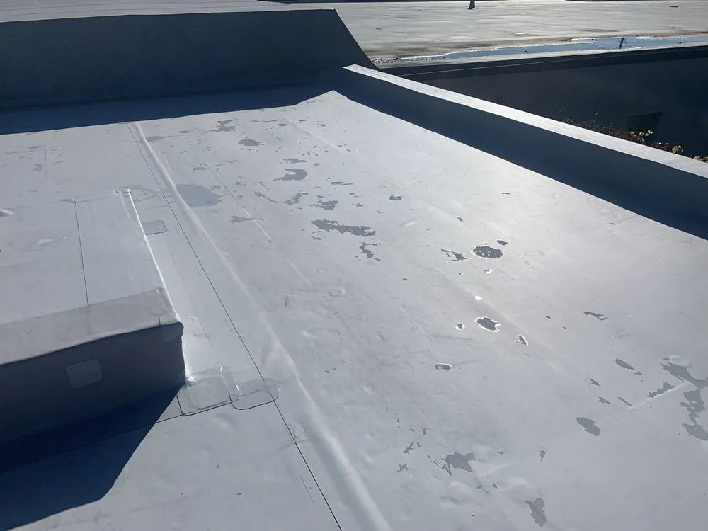 Slide of TLC Roofing