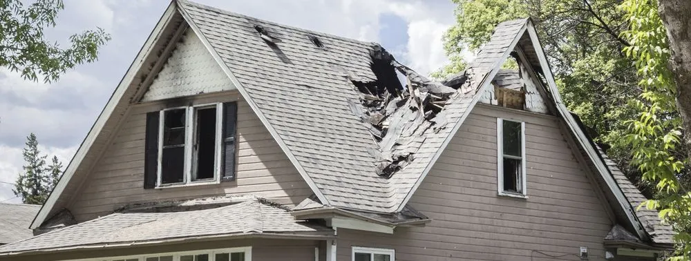 Slide of TM Roofing & Construction Group