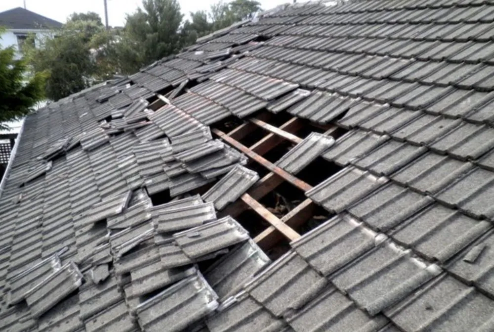 Slide of TM Roofing & Construction Group