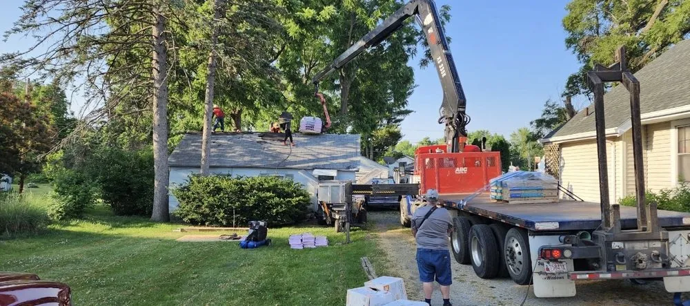 Slide of TM Roofing and Construction