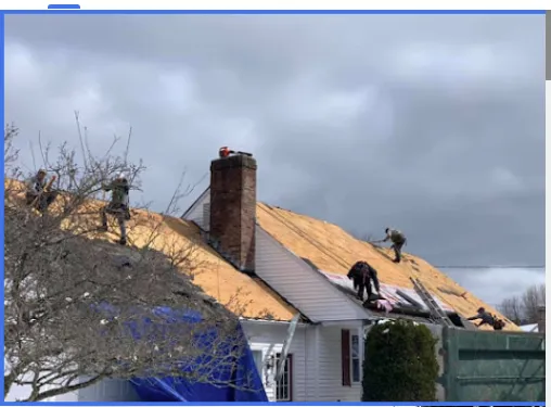 Slide of TM Roofing Siding