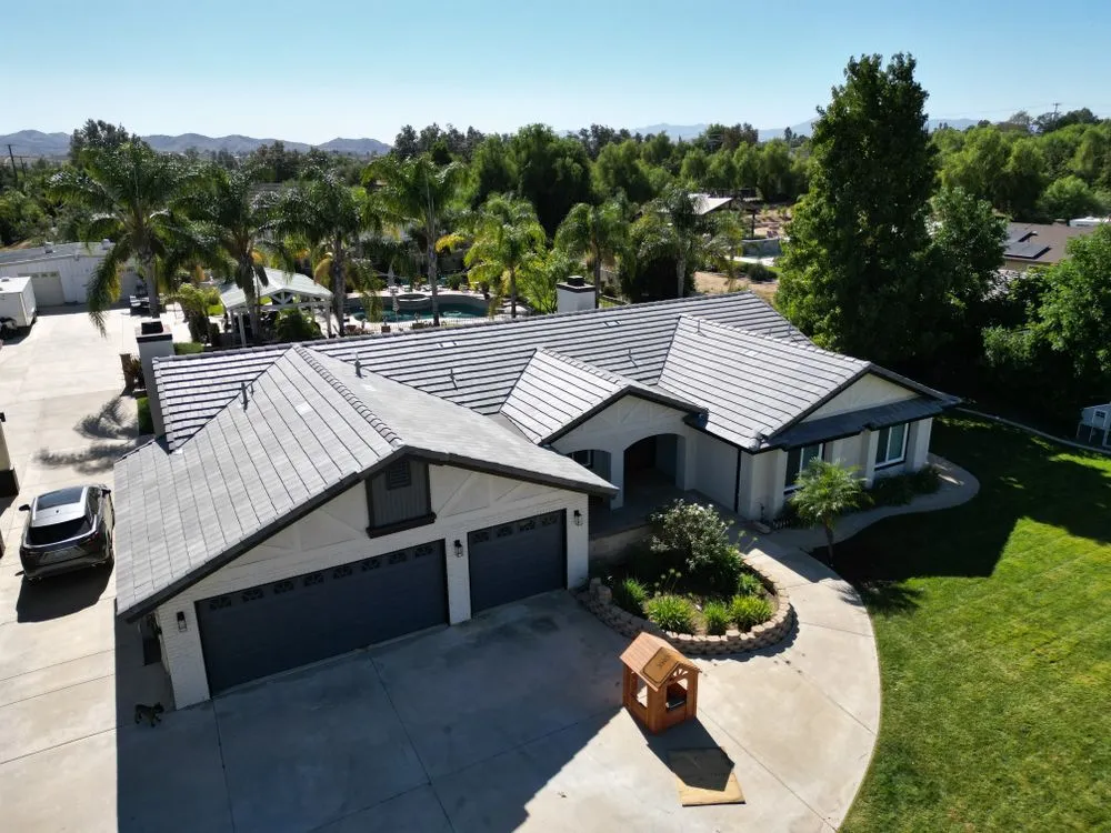 Slide of TMC Roofing