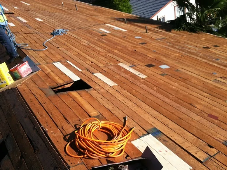 Slide of TMH Roofing