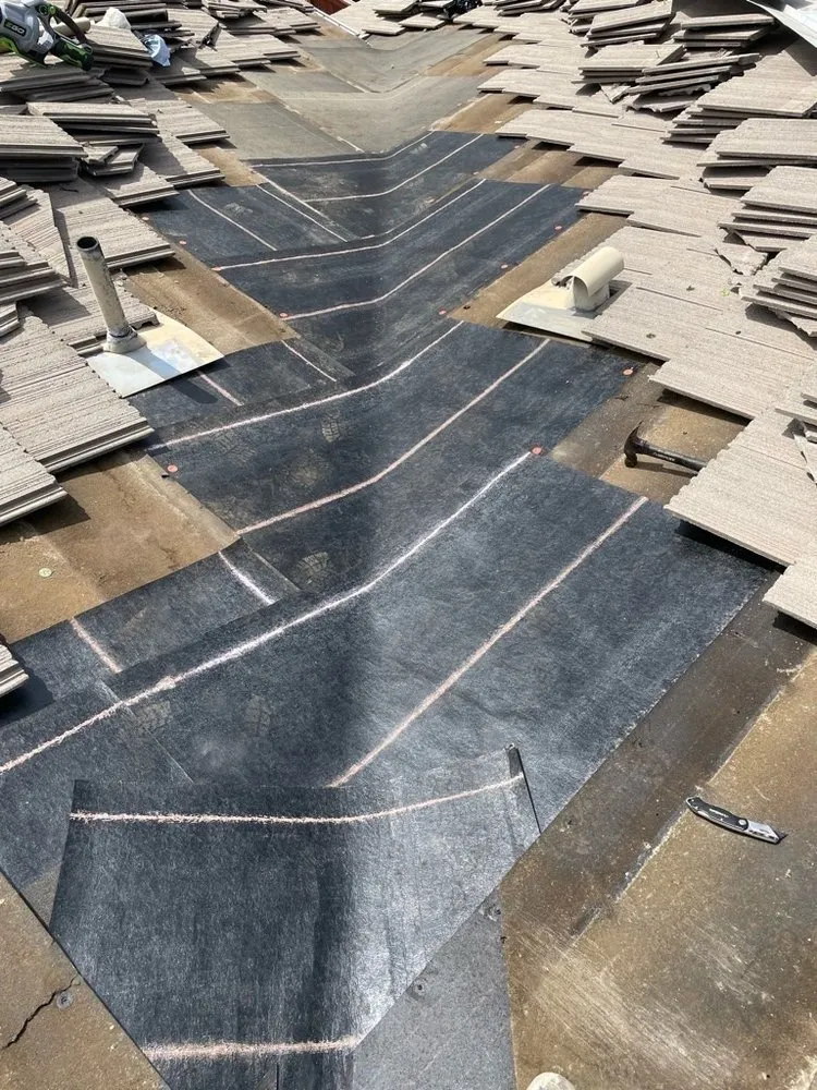 Slide of TMH Roofing