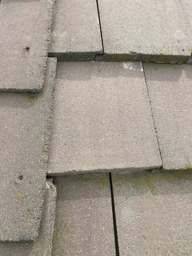 Slide of TMH Roofing