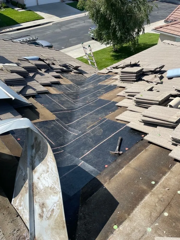 Slide of TMH Roofing