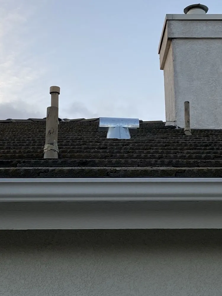 Slide of TMH Roofing