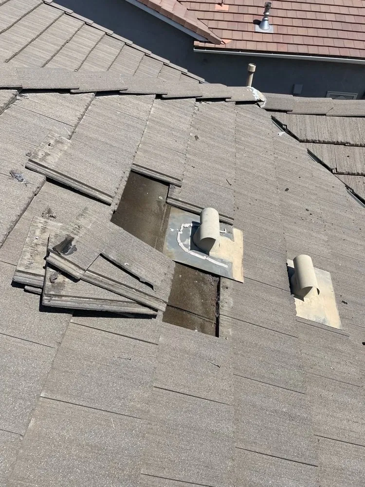 Slide of TMH Roofing