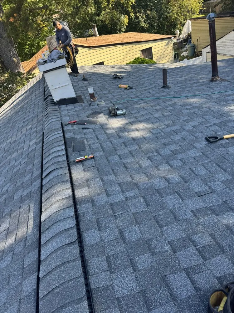 Slide of Tml Roofing