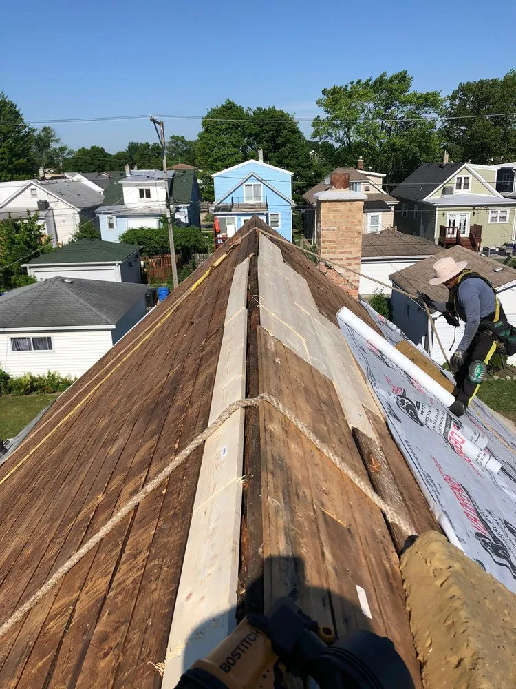 Slide of TM&S Shingle Roofing Contractor