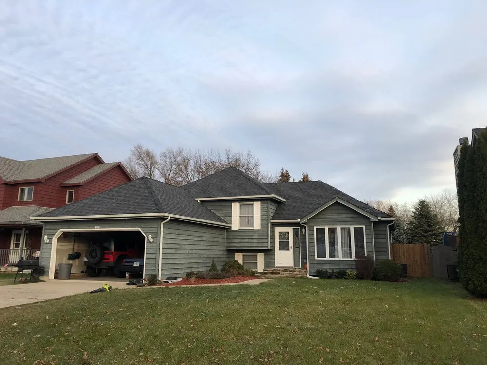 Slide of TM&S Shingle Roofing Contractor