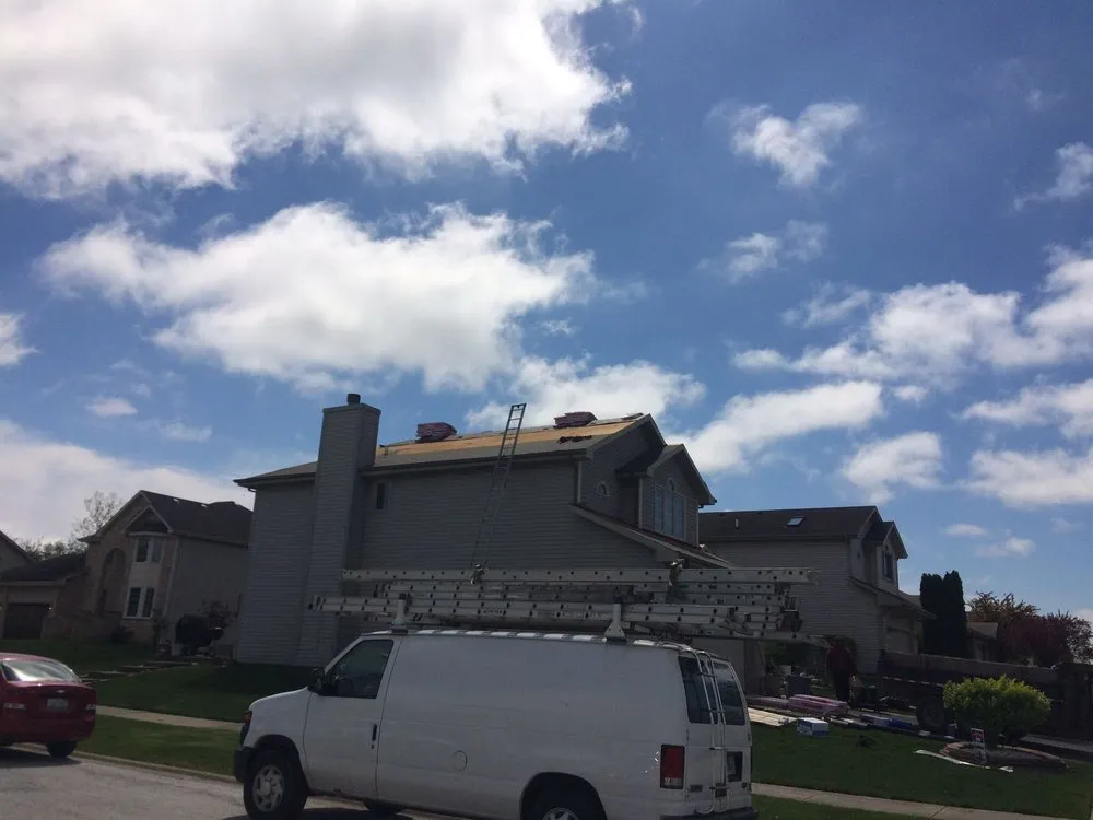 Slide of TM&S Shingle Roofing Contractor