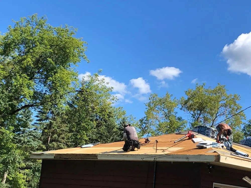 Slide of TM&S Shingle Roofing Contractor