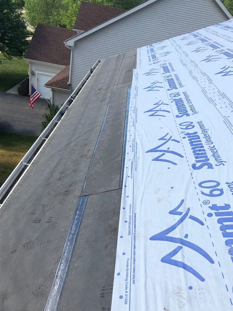 Slide of TM&S Shingle Roofing Contractor