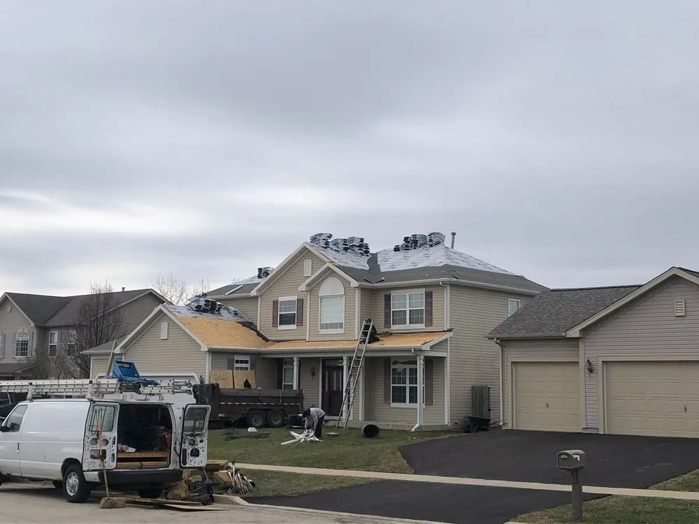 Slide of TM&S Shingle Roofing Contractor