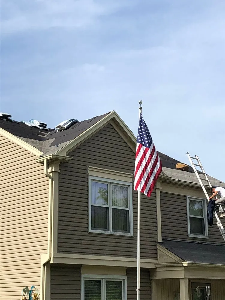 Slide of TM&S Shingle Roofing Contractor