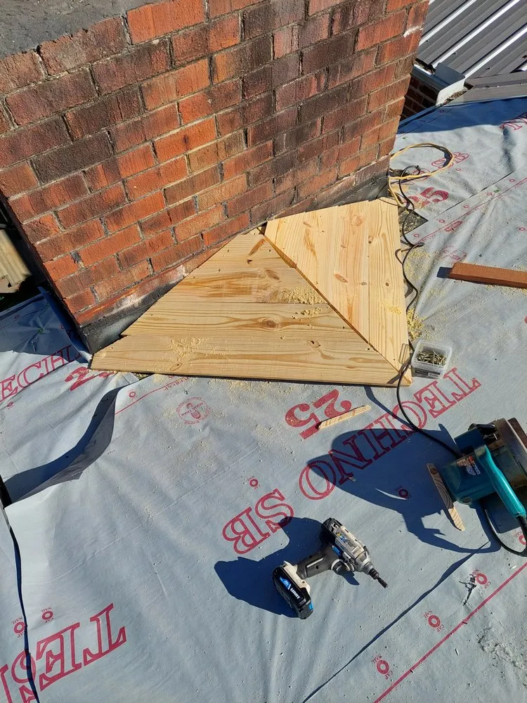 Slide of TMT Roofing