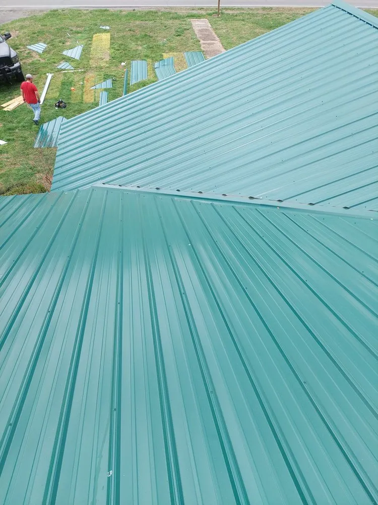 Slide of TMT Roofing
