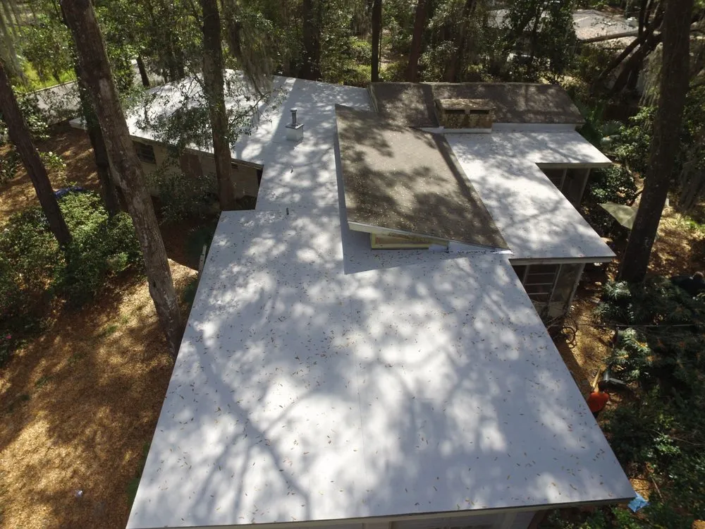 Slide of TMT Roofing