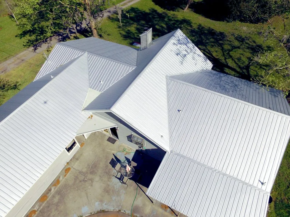 Slide of TMT Roofing