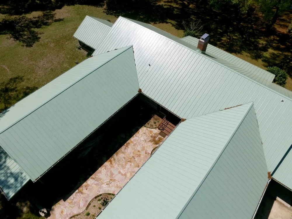 Slide of TMT Roofing