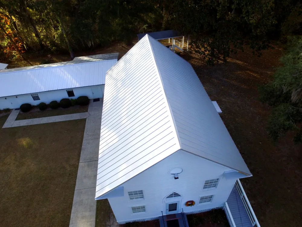 Slide of TMT Roofing