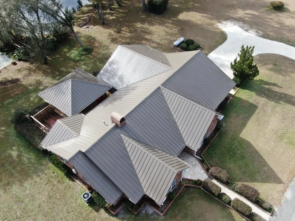 Slide of TMT Roofing