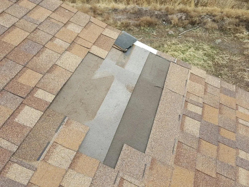 Slide of TNT Custom Roofing