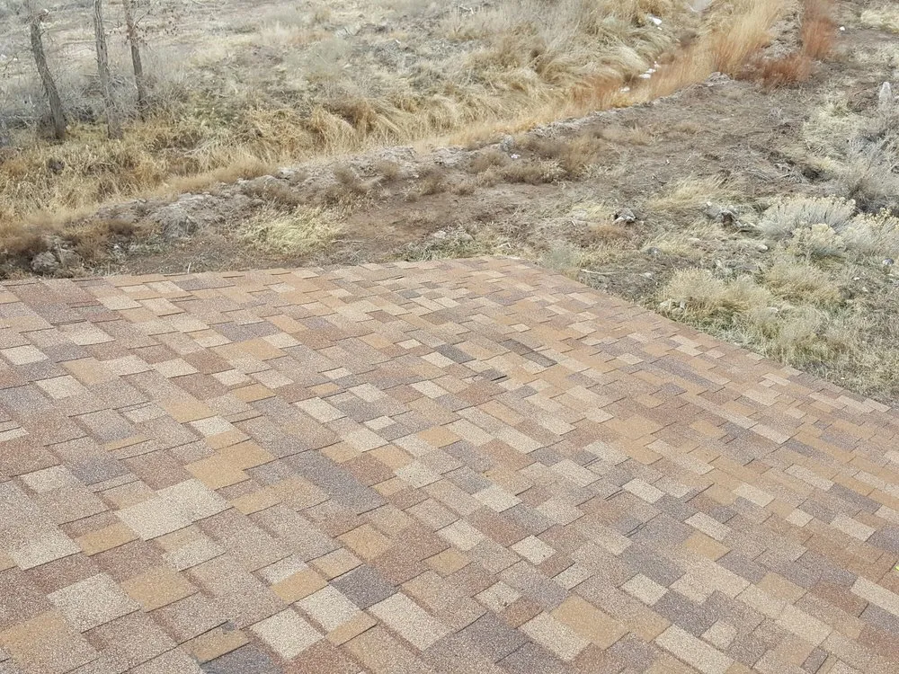 Slide of TNT Custom Roofing