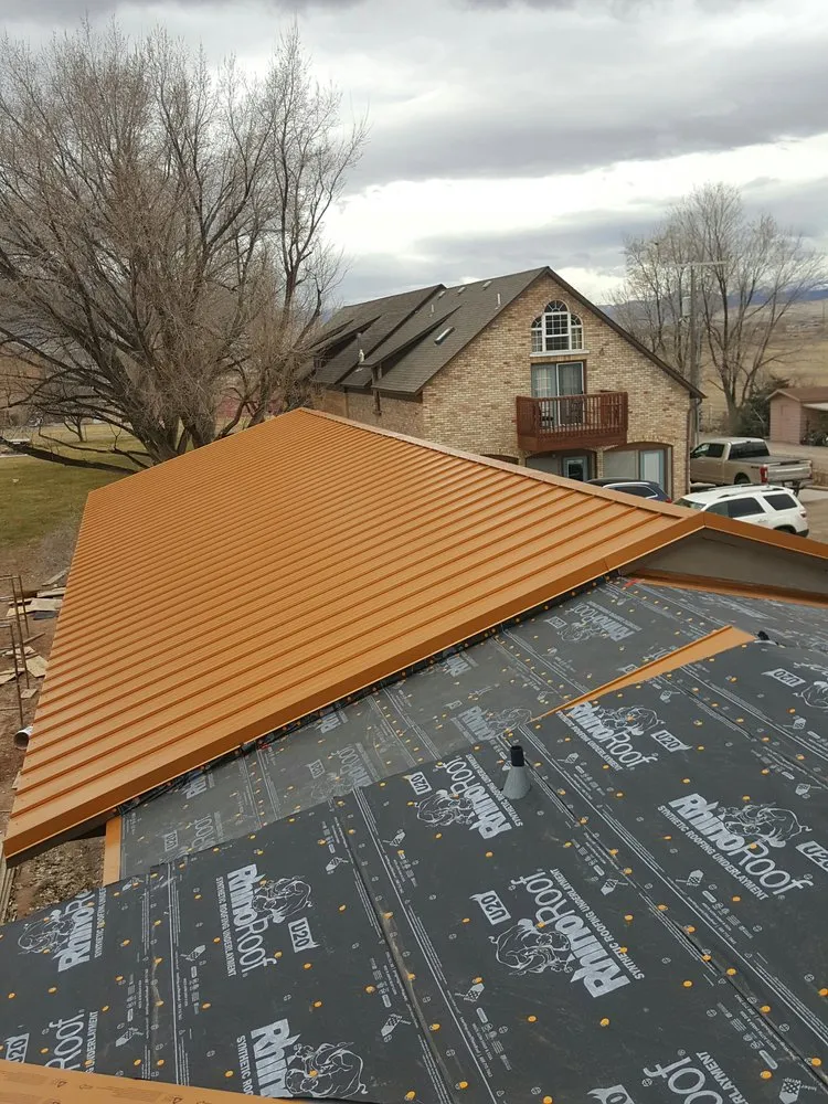 Slide of TNT Custom Roofing