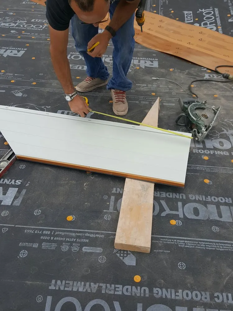 Slide of TNT Custom Roofing