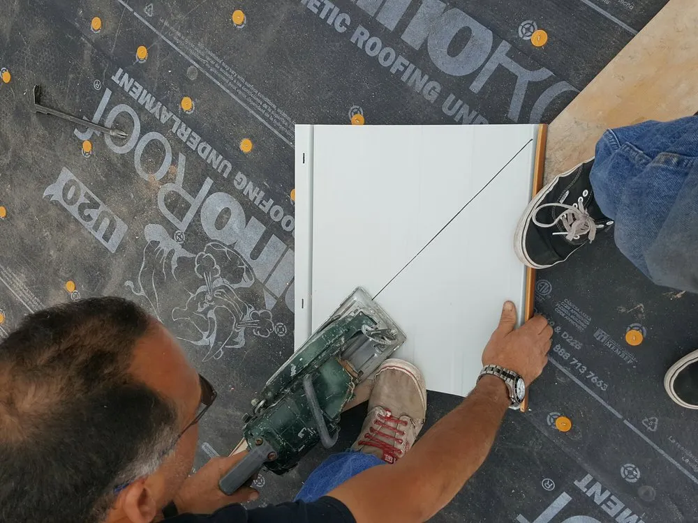 Slide of TNT Custom Roofing