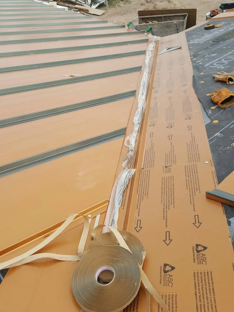 Slide of TNT Custom Roofing