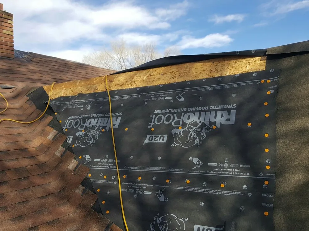 Slide of TNT Custom Roofing