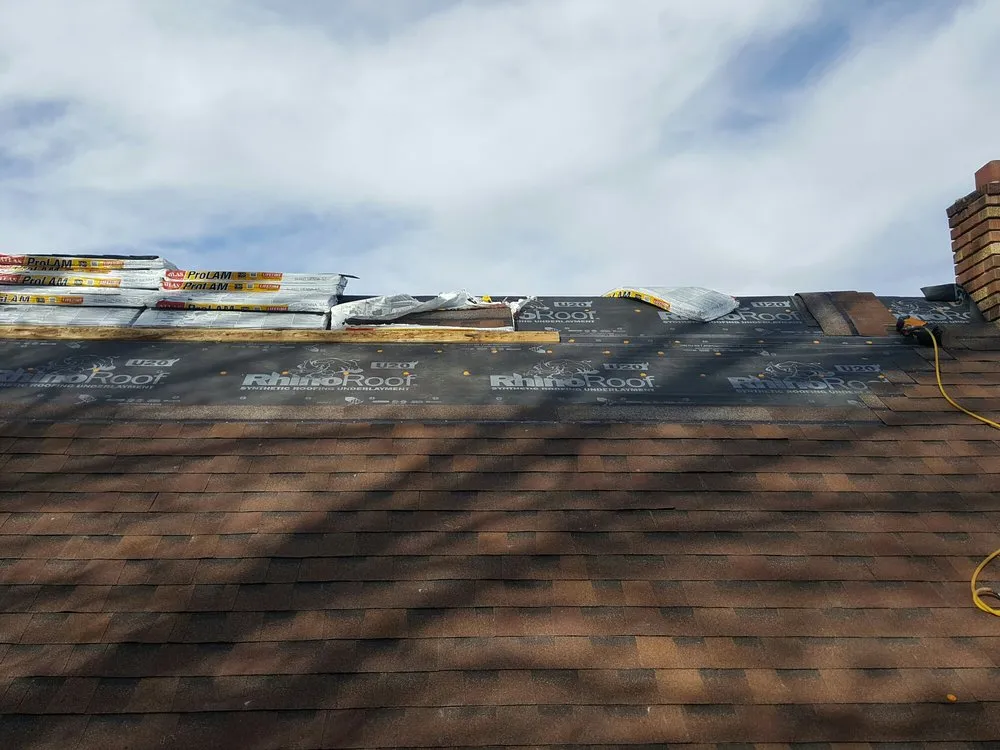 Slide of TNT Custom Roofing