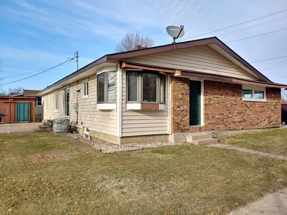 Slide of TNT Exteriors