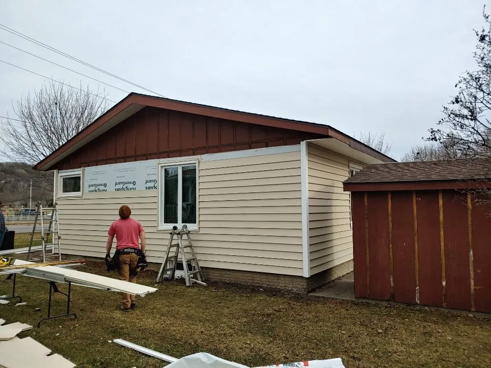 Slide of TNT Exteriors