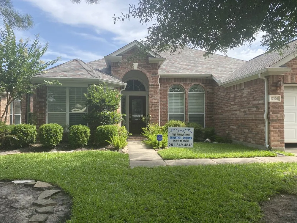 Slide of TNT Renovations Signature Roofing