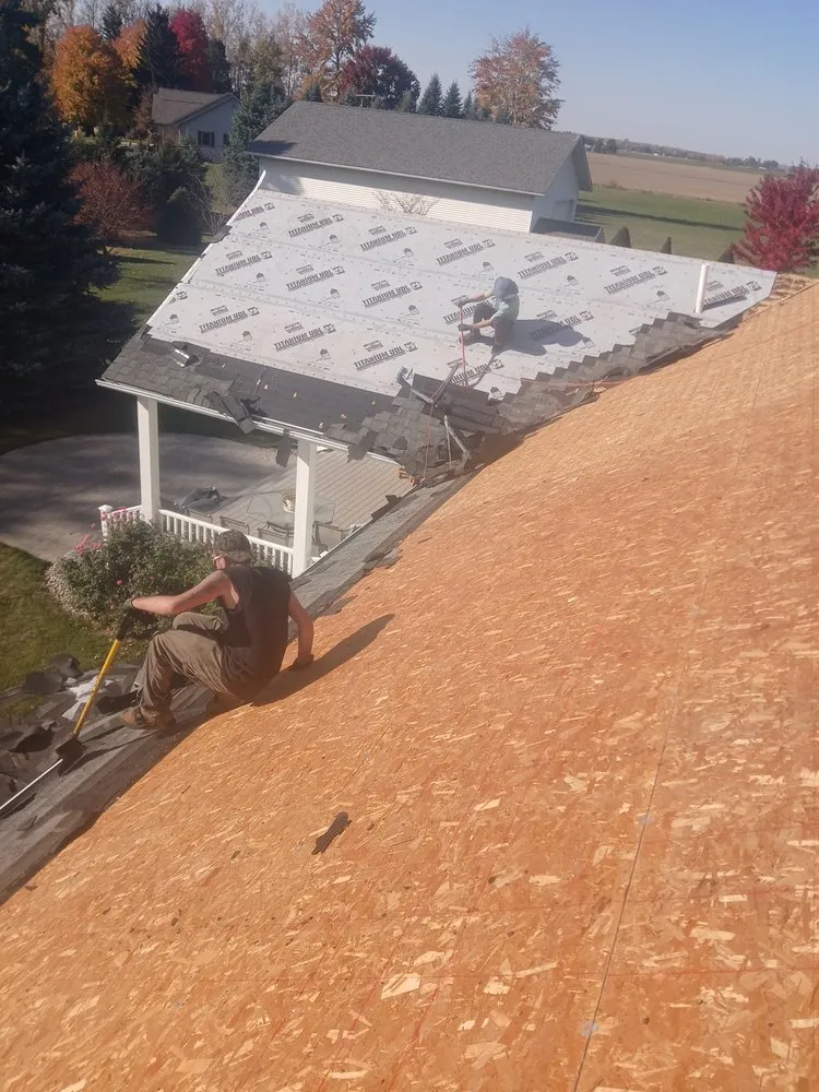 Slide of TnT Roofing & Construction