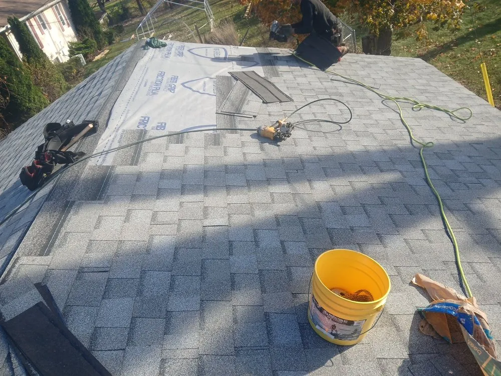 Slide of TnT Roofing & Construction