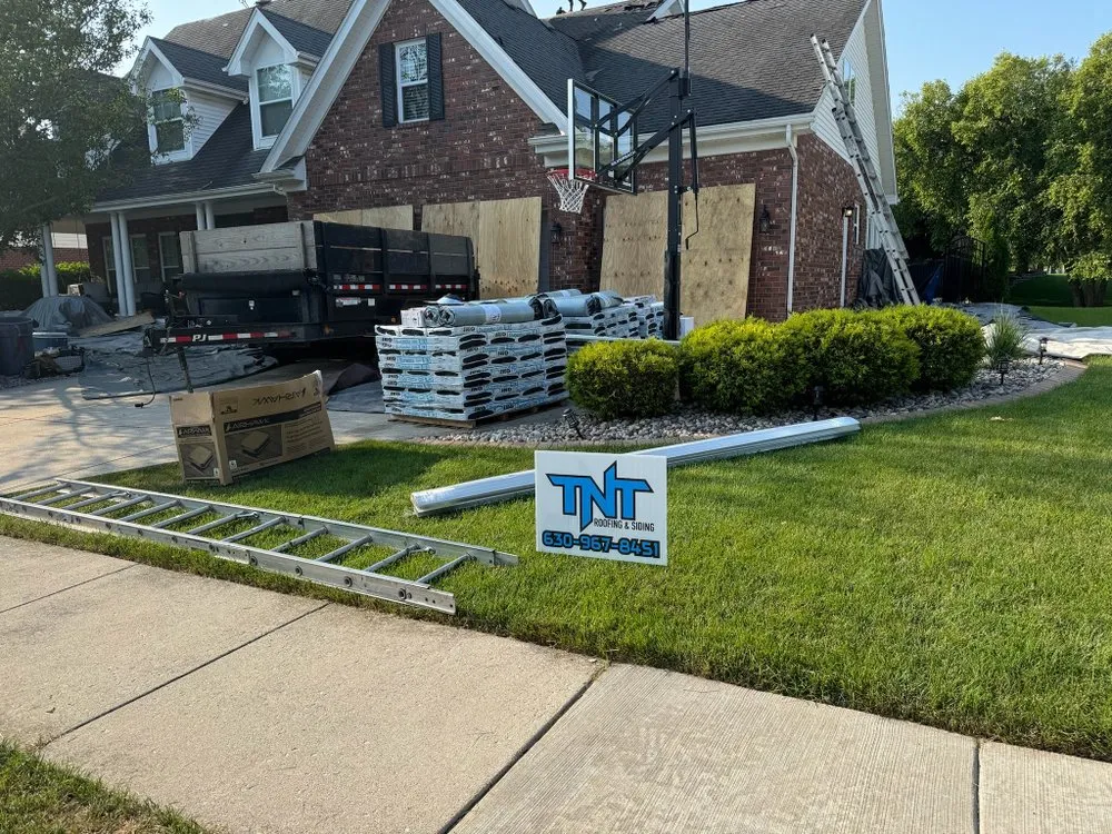Slide of TNT Roofing and Siding