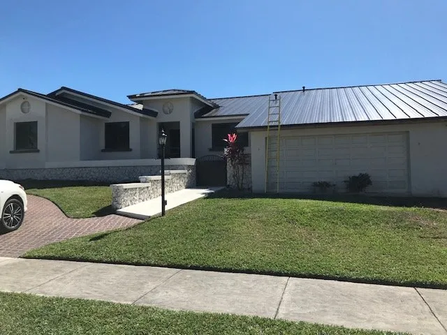 Slide of TNT Roofing